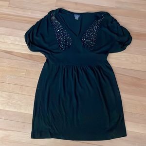 Woman’s studded V neck dress